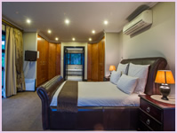 Main bedroom at Zimbali Holiday Home's Acaciawood villa
